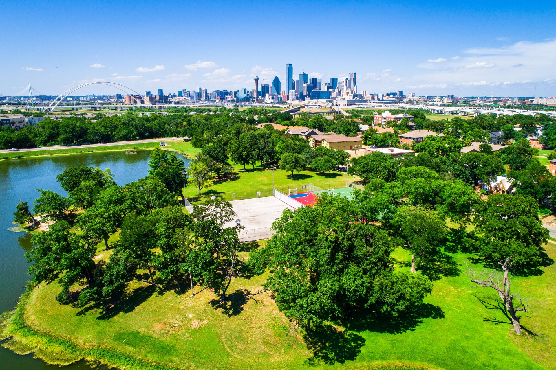 Green Landscape and Pong with Downtown Dallas Texas Skyline Cityscape in the far background 2019